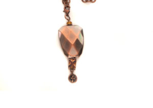 Copper Colored Aqua & Red Dangling Pendant with Fleur De Lis