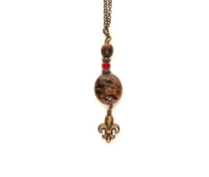 Antique Brass Necklace with Animal Print & Dangling Fleur De Lis
